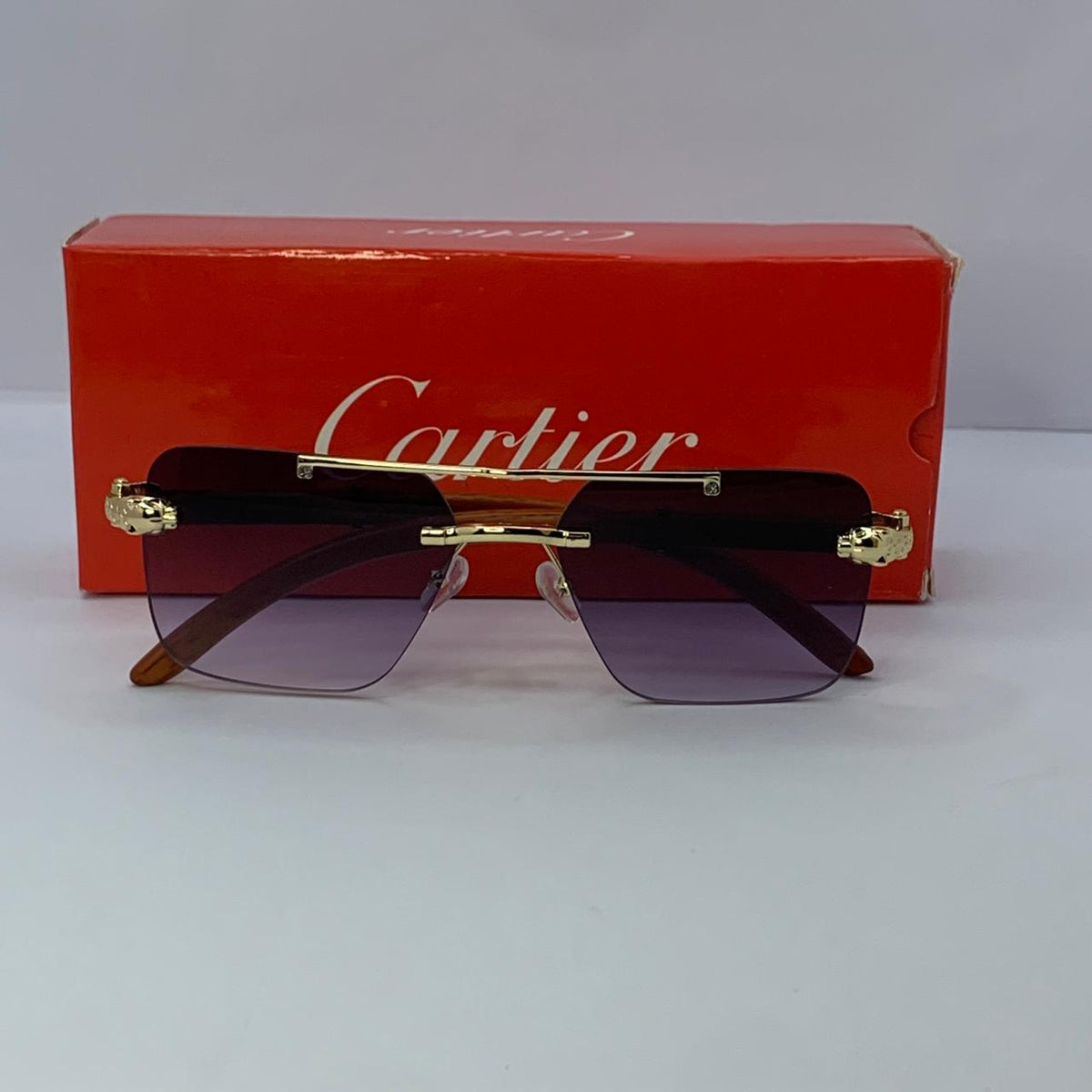 Cartier Gold & Wooden Frame Sunglasses | Rimless Shield Design