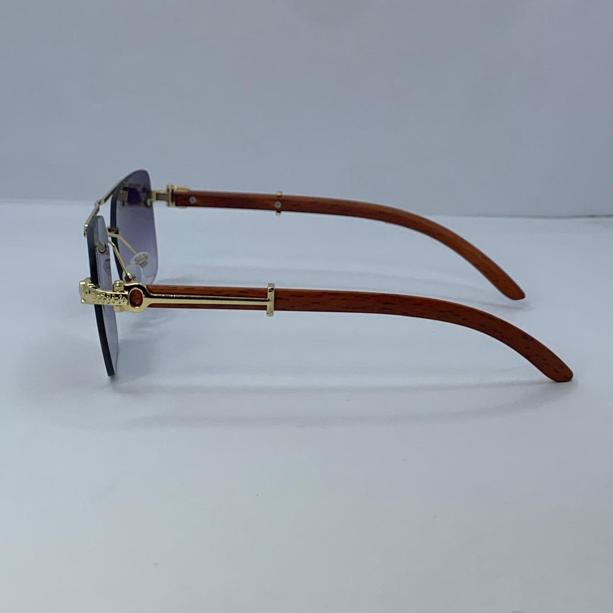 Cartier Gold & Wooden Frame Sunglasses | Rimless Shield Design