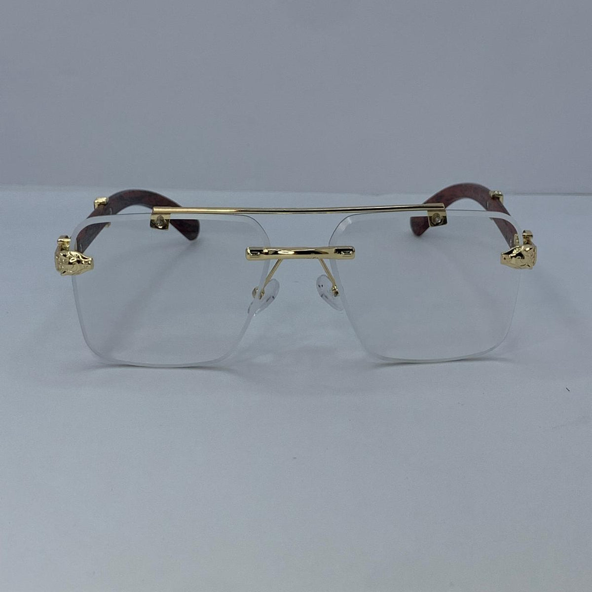 Cartier Auto-Tint Gold & Wooden Frame Sunglasses | Photochromic Rimless Shield Design